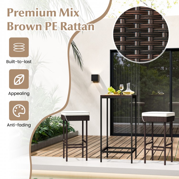 Brown PE rattan barstools set with footrest and soft cushions, ideal for backyard or balcony relaxation.