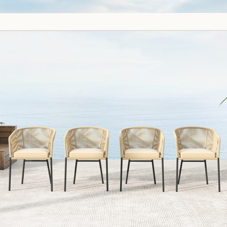 Set of 4 yellow patio chairs with curved backrests and seat cushions, ideal for outdoor relaxation and support.