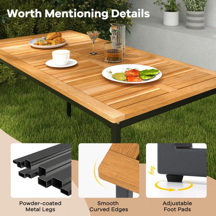Acacia wood dining table for 6 with slatted top, powder-coated metal legs, and adjustable foot pads for outdoor use.