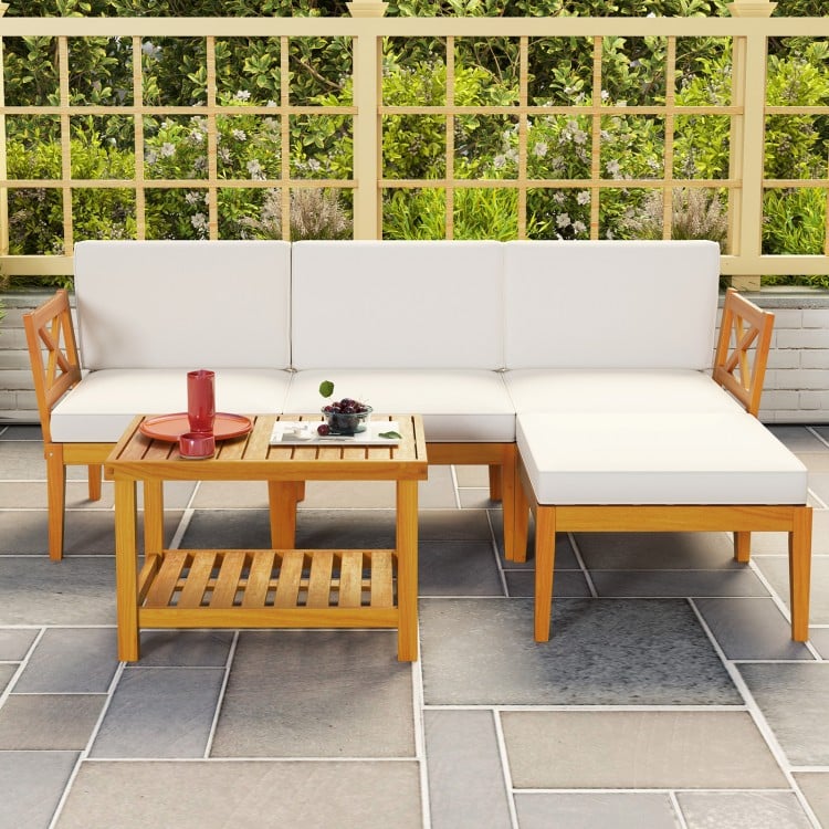 5-piece acacia wood patio furniture set with white cushions and 2-tier coffee table, perfect for outdoor relaxation.