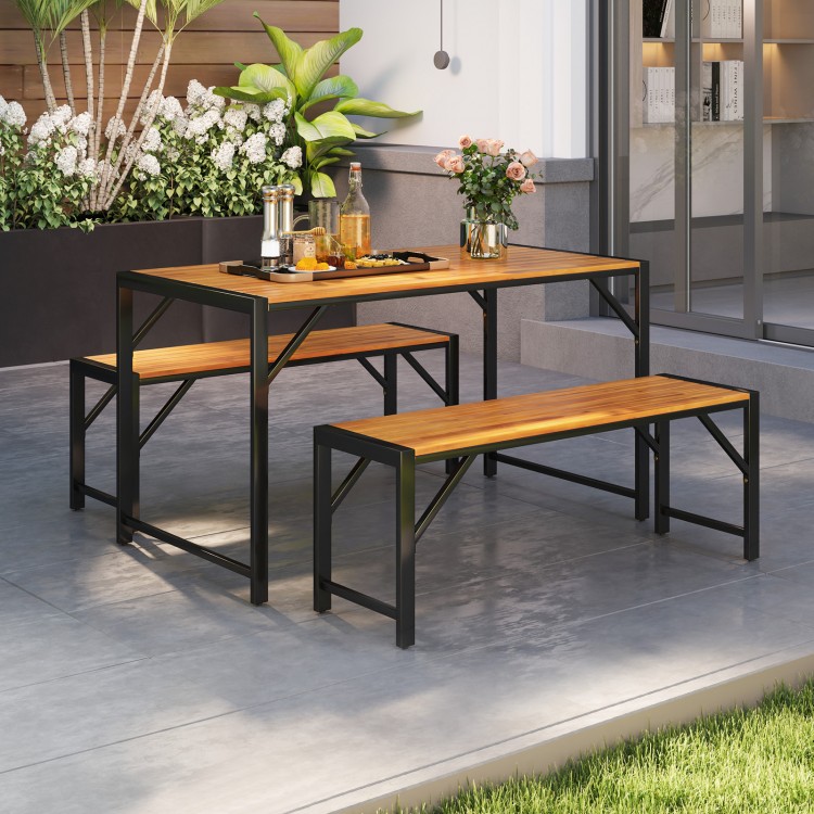 Patio dining set featuring an acacia wood table and two benches, perfect for outdoor gatherings and space-saving.