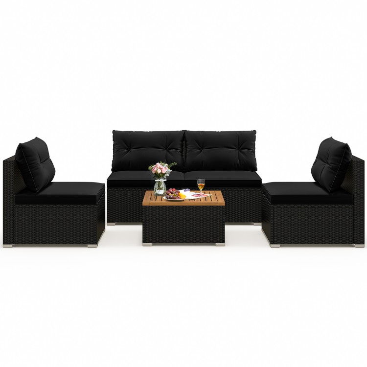 5-piece outdoor furniture set in black with soft cushions and a solid tabletop, perfect for backyard or poolside.