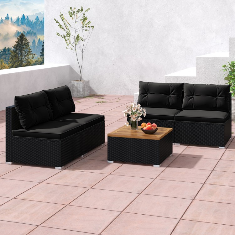 5-piece outdoor furniture set featuring black cushions and a solid tabletop, ideal for backyard and poolside relaxation.