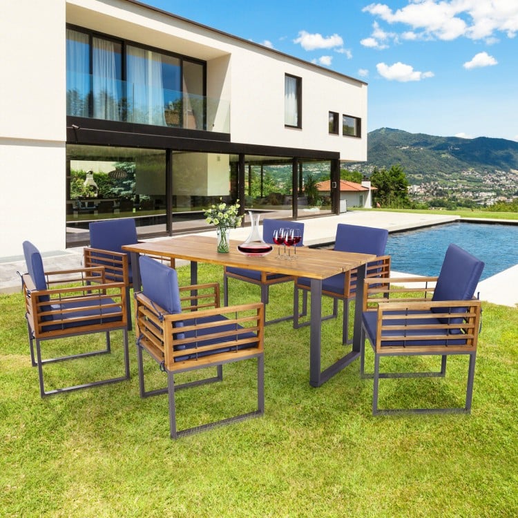 Outdoor acacia wood dining chairs set of 6 with navy seat back cushions, perfect for poolside or backyard dining.