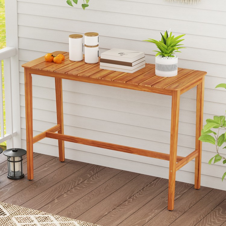 Acacia wood counter height table with slatted tabletop, perfect for outdoor gatherings on balconies or patios.