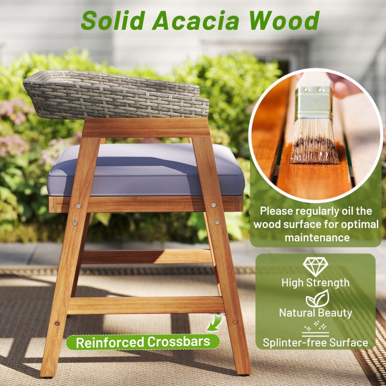 Outdoor acacia wood dining chair with gray cushion, featuring reinforced crossbars for strength and natural elegance.