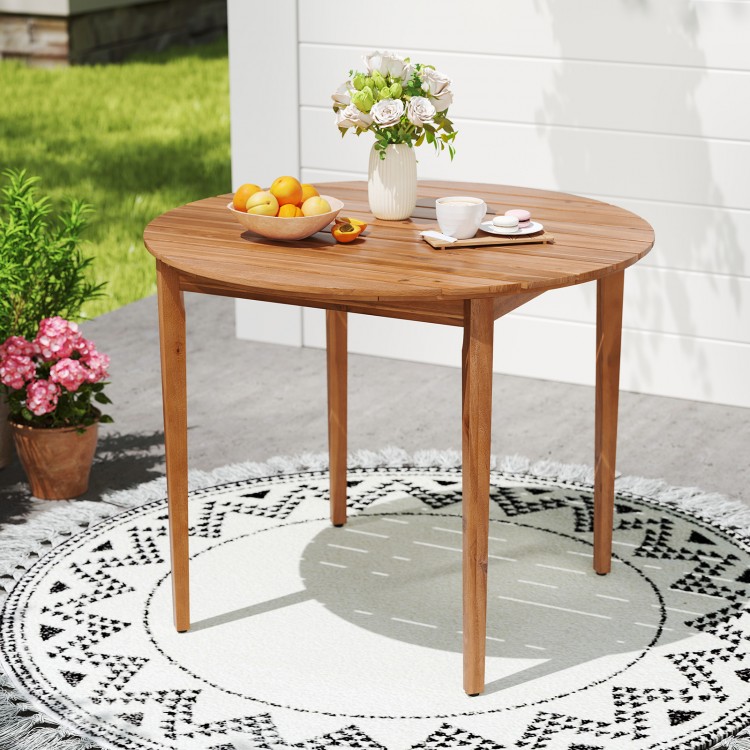 Round 36-inch acacia wood outdoor dining table for 4, featuring slatted design and smooth corners, perfect for patio.