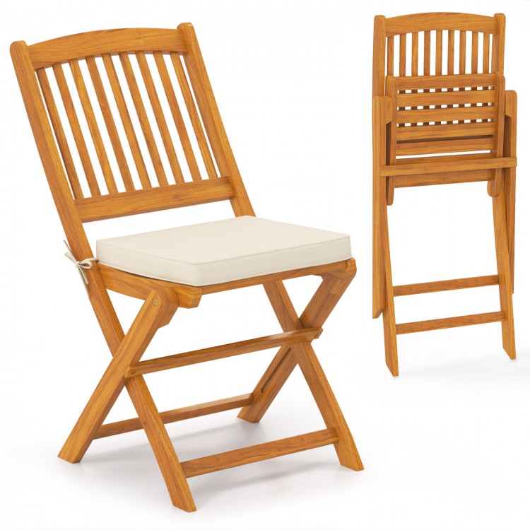 Folding outdoor chair set made of acacia wood with beige seat cushions, ideal for picnics and dining.
