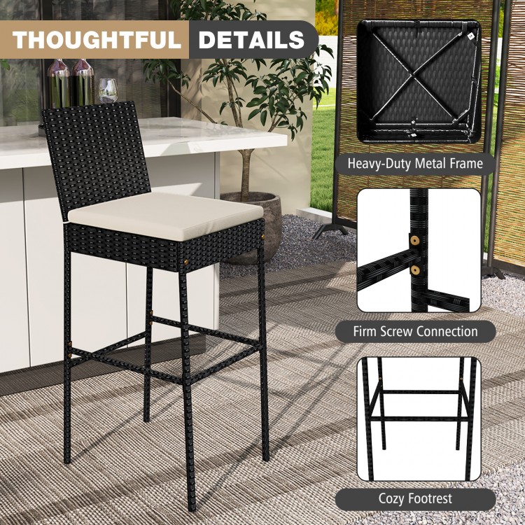 Black patio wicker barstool with backrest and footrest, featuring a durable PE rattan design for backyard comfort.