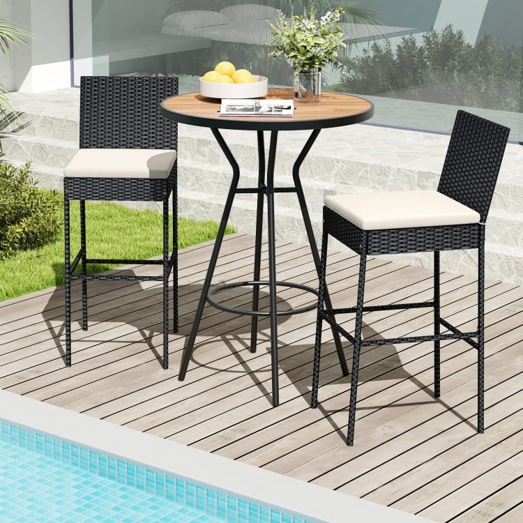 Patio wicker barstools with backrest and footrest, featuring a reinforced metal frame, ideal for poolside relaxation.