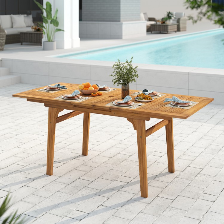 Expandable 55-inch patio dining table made of solid acacia wood, seating 6-8 people, with an umbrella hole for outdoor.