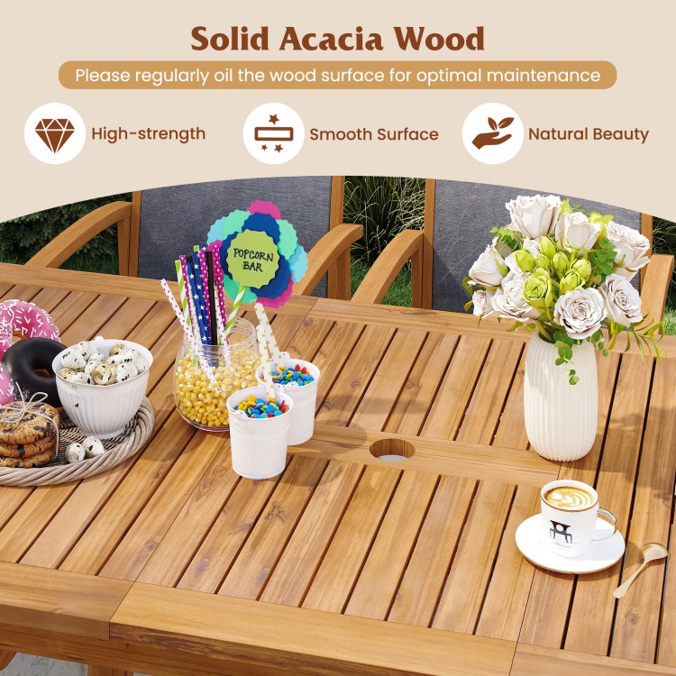 Close-up view of the solid acacia wood surface of a 55-inch expandable patio dining table, showcasing its smooth.