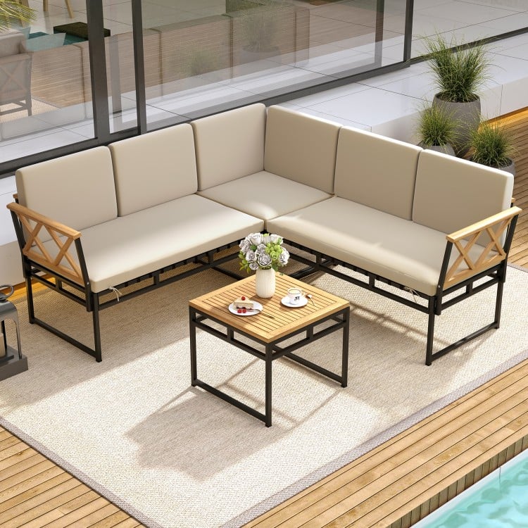 L-shaped patio sofa set with beige cushions and acacia wood armrests, perfect for backyard or poolside relaxation.
