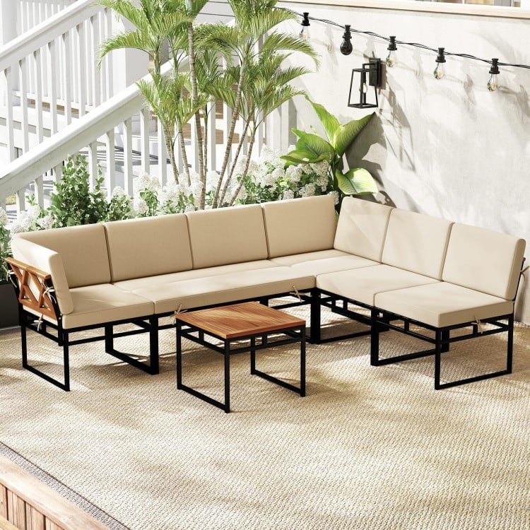 Beige 6-piece outdoor sectional sofa set with metal frame and acacia wood tabletop, perfect for backyard relaxation.
