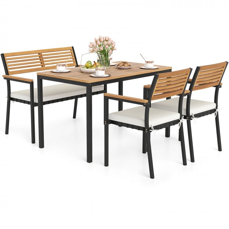4-piece outdoor dining set featuring acacia wood table and chairs with cushions, perfect for patio gatherings.