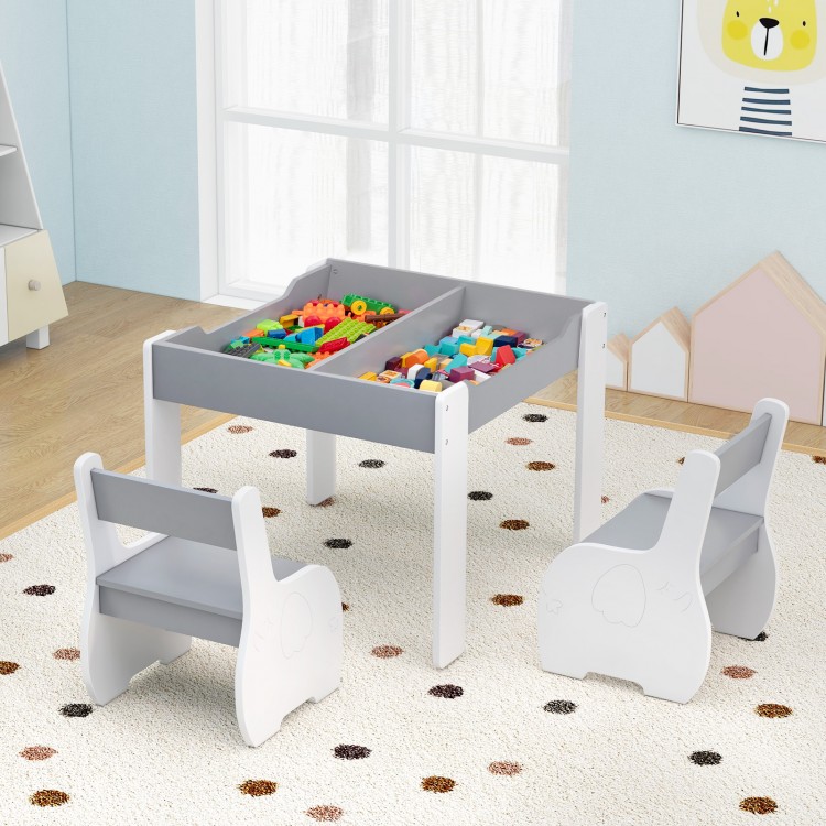 Gray 4-in-1 wooden activity table with storage and detachable blackboard, paired with two matching chairs for kids'.