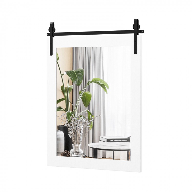 Wall-mounted mirror with a solid wood frame and black metal bracket, ideal for rustic decor in any room.