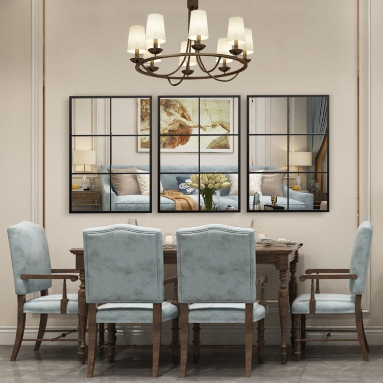 3-layered decorative wall mirror with black metal frame, ideal for dining or living room decor, mounted horizontally.