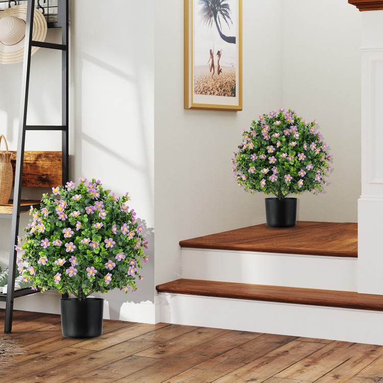 Artificial boxwood topiary ball trees with purple flowers in black pots, perfect for home or office decor.