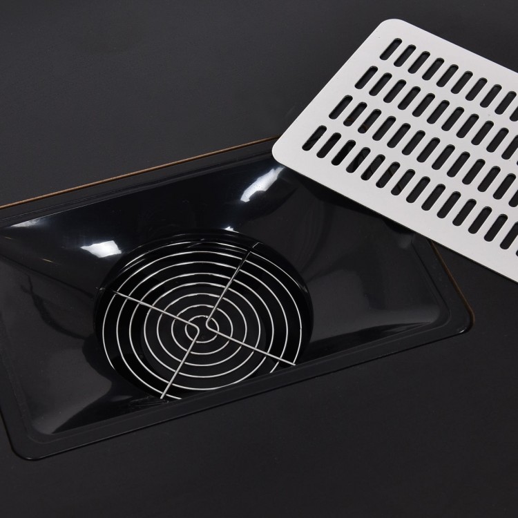 Close-up of the electric downdraft nail vent on the Deluxe Salon Steel Frame Manicure Table for minimizing dust.