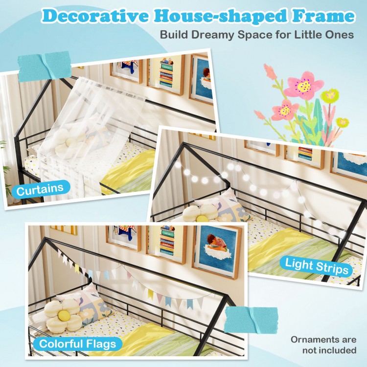 House-shaped metal twin over twin low bunk bed in black with decorative curtains, colorful flags, and light strips.