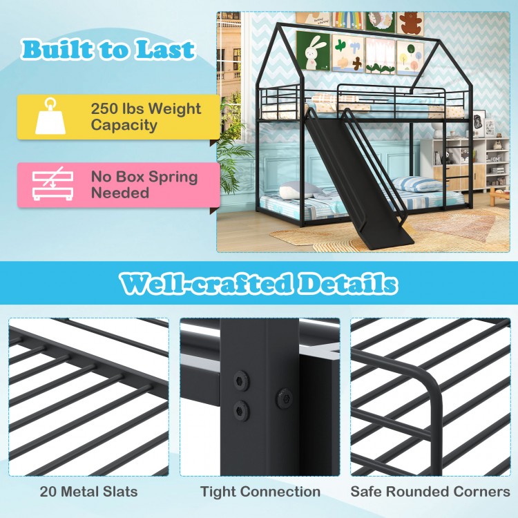 House-shaped black metal twin over twin low bunk bed with slide, safety guardrails, and 250 lbs weight capacity.