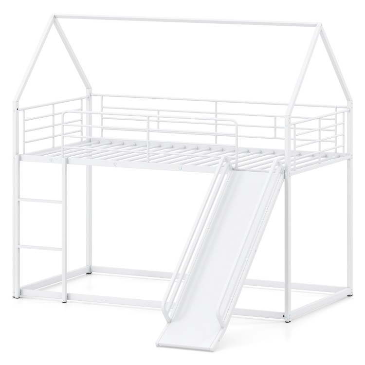 House-shaped metal twin over twin low bunk bed in white with slide, safety guardrails, and sturdy design for kids' play.