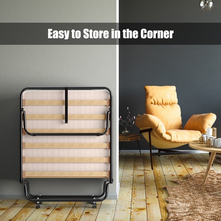Folding guest bed with memory foam mattress, compact storage design, ideal for living room or bedroom use.