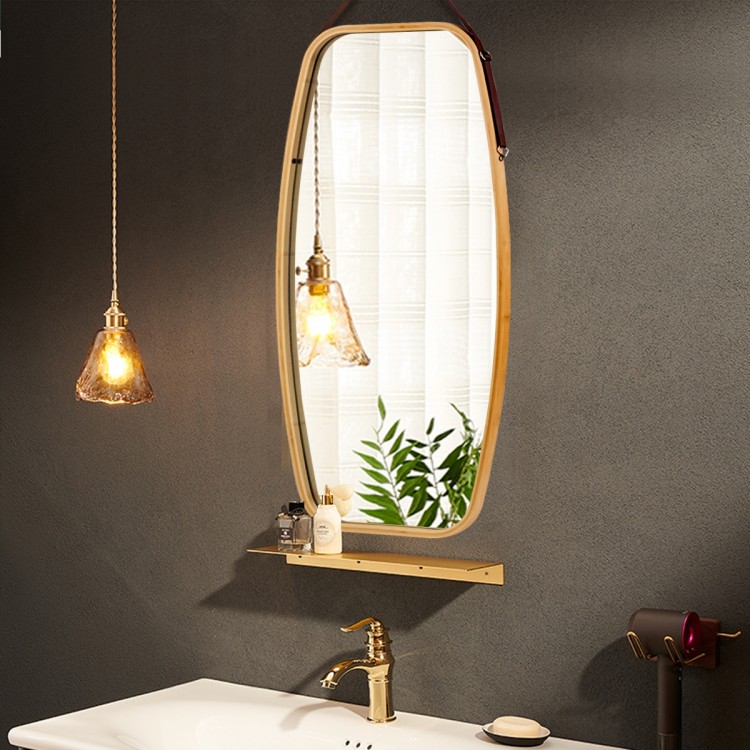 Modern wall mirror with bamboo frame and adjustable leather strap, perfect for bathroom or living room decor.