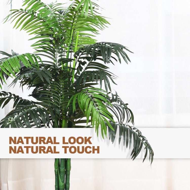 Close-up of the realistic leaves of a 3.5 feet artificial Areca palm tree, adding a natural touch to any indoor space.