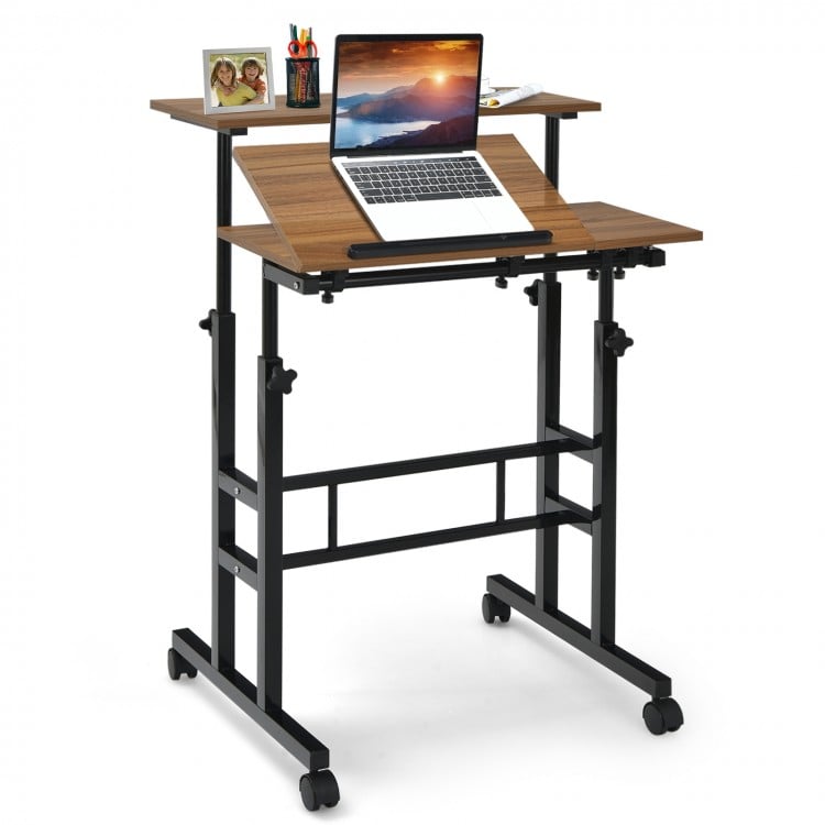 Mobile standing desk with adjustable height and tilting surface, featuring a walnut finish and rolling casters for easy.