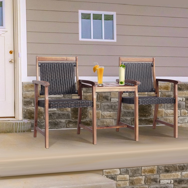 Two acacia wood and PE rattan chairs with a coffee table, perfect for outdoor patio relaxation.