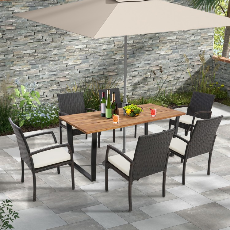 Rectangular 6-person acacia wood outdoor dining table with 2-inch umbrella hole, set in a patio environment.