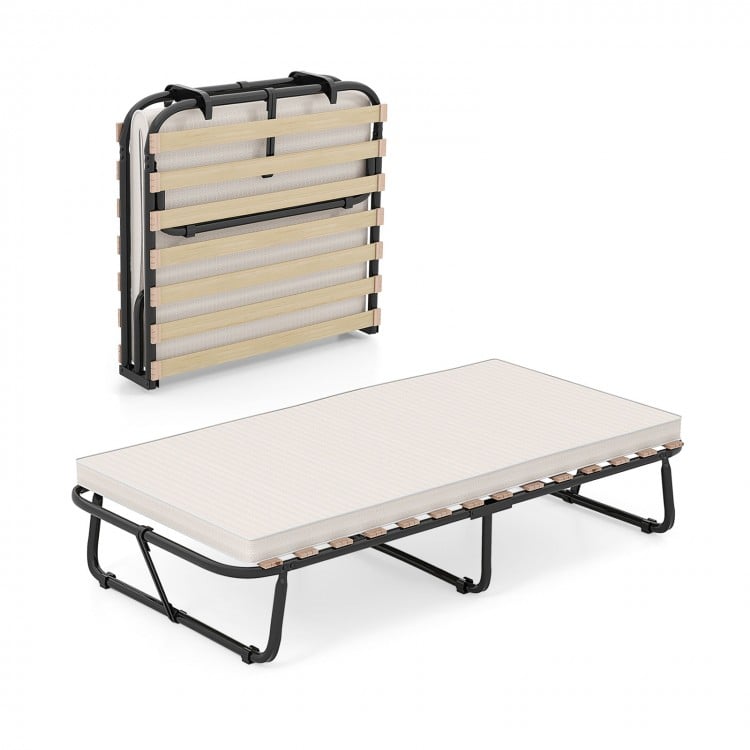 Twin size folding guest bed with memory foam mattress, featuring a sturdy steel frame and quick folding design for easy.