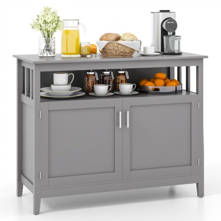 Gray wooden kitchen locker featuring a spacious top, open shelf, and double door compartment for versatile storage.