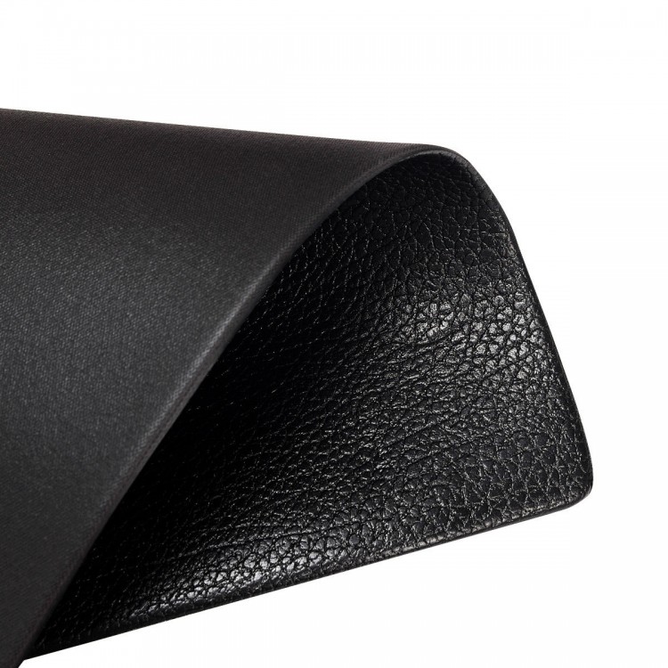 Textured black PVC equipment mat, 47 x 24 x 0.3 inches, designed for home gym use, protects floors and reduces noise.