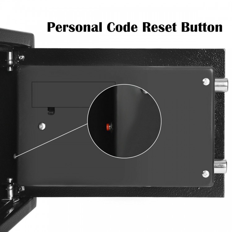 Close-up of the personal code reset button on a 2-layer safe deposit box with digital keypad for enhanced security.