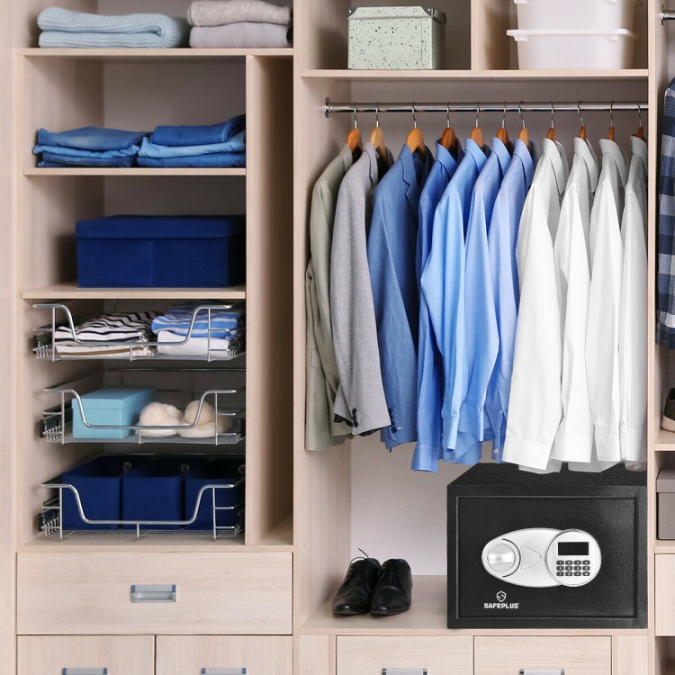 2-layer safe deposit box with digital keypad, made of durable steel, mounted in a closet for secure storage of.