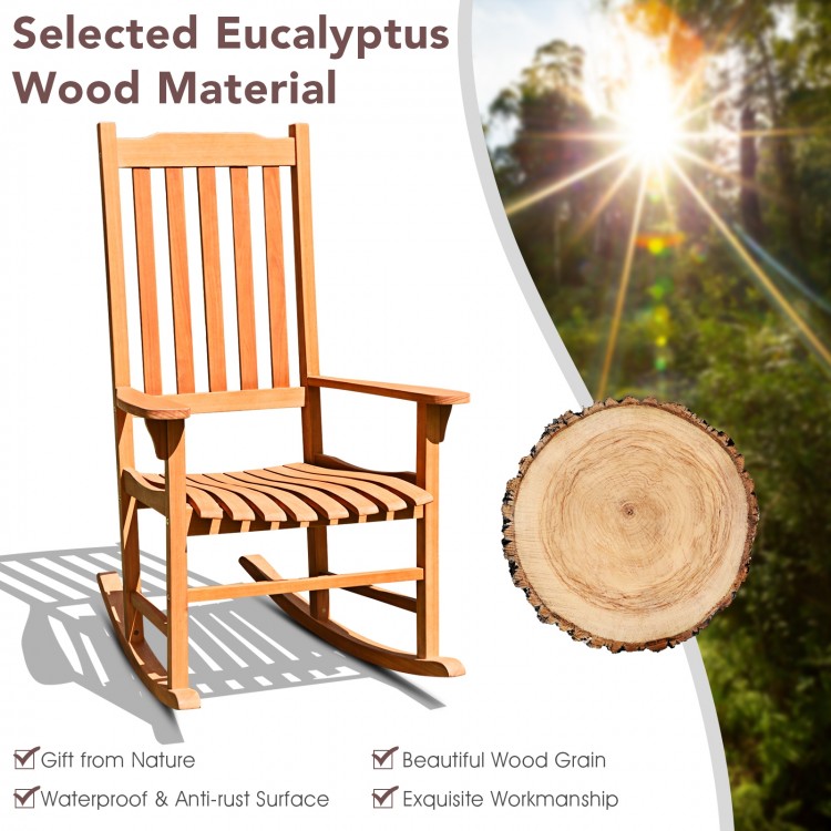 Outdoor rocking chair made of premium eucalyptus wood with a contoured seat, perfect for patio relaxation.