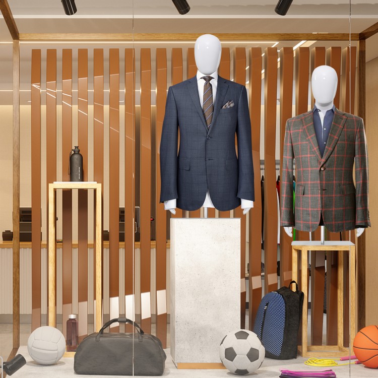 Male half body mannequin with adjustable metal base, showcasing stylish attire in a contemporary display setting.