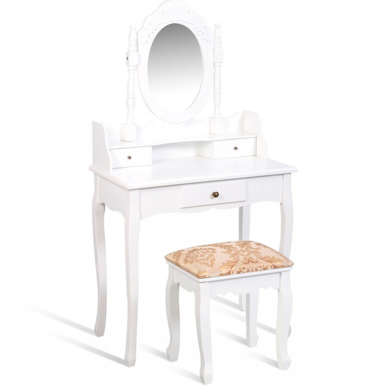 Vanity makeup dressing table in white with rotating mirror, three drawers, and cushioned stool for elegant storage.