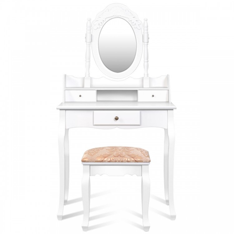 Vanity makeup dressing table in white with rotating mirror, cushioned stool, and three storage drawers for cosmetics.