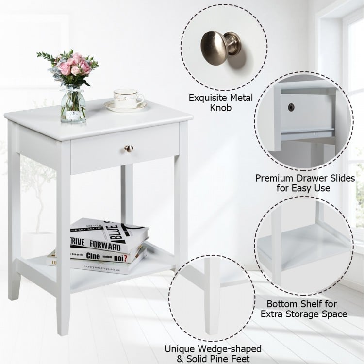White wooden bedside table featuring a spacious tabletop, pull-out drawer, and bottom shelf for convenient storage.