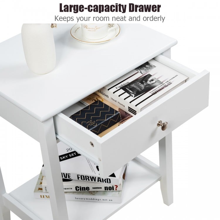 White bedside table featuring a large-capacity drawer and open shelf for organized storage in any home decor.