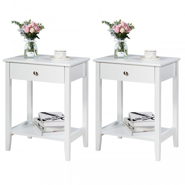 Set of 2 white wooden bedside tables with spacious tabletop, drawer, and open shelf for convenient storage.