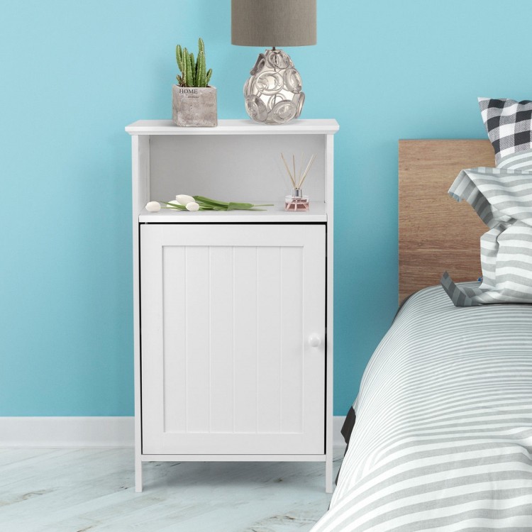 Freestanding white storage cabinet with adjustable shelf, perfect for bathroom or living room organization.