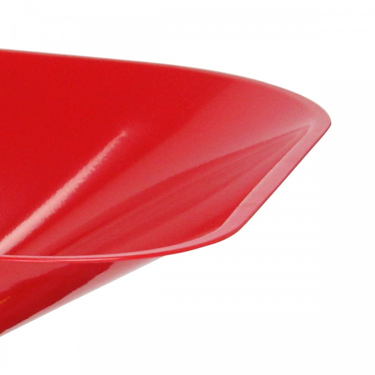 Red seamless steel tray of a kids' metal wheelbarrow, designed for safe outdoor play and transporting toys.