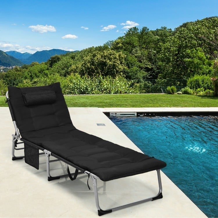Black 4-fold oversized padded folding lounge chair by the pool, featuring a removable mattress and adjustable positions.