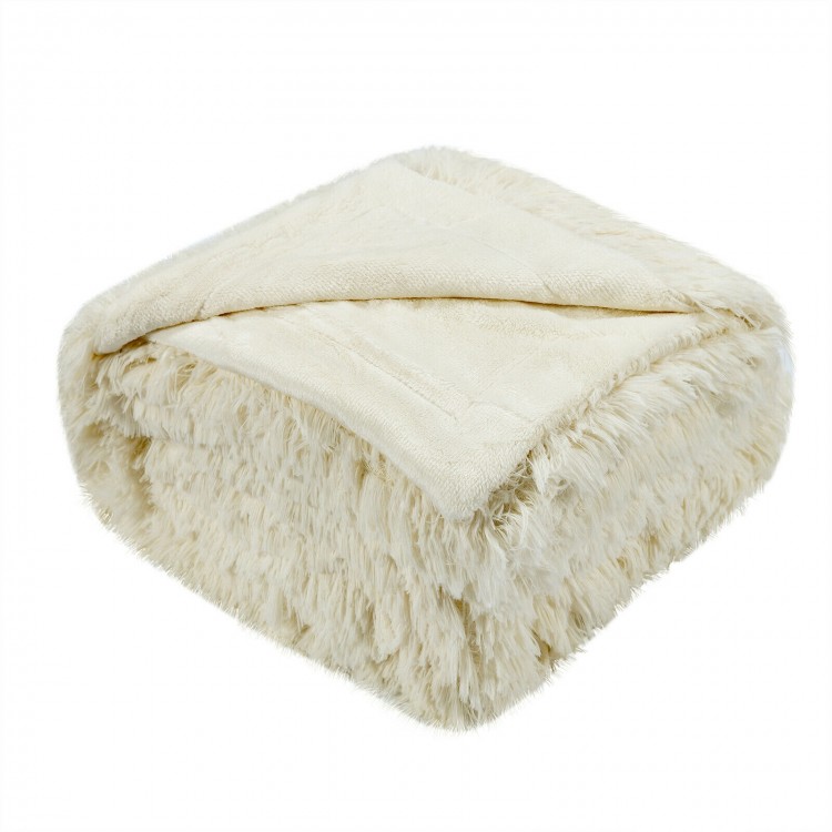 Double-sided throw blanket in beige, featuring shaggy fur and smooth velvet, perfect for cozying up on chilly nights.
