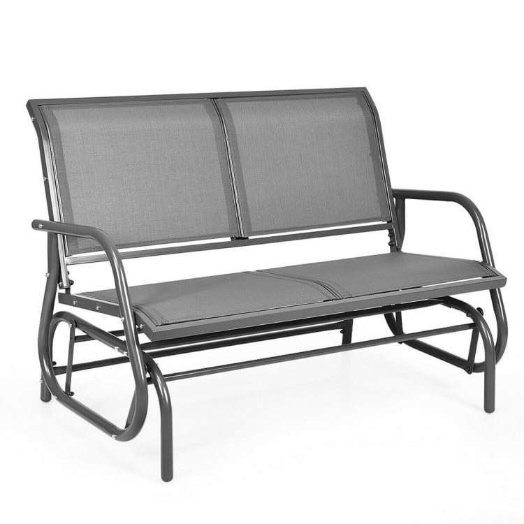 Gray swing glider chair with curved backrest and armrests, made of sturdy steel, ideal for outdoor patios and gardens.
